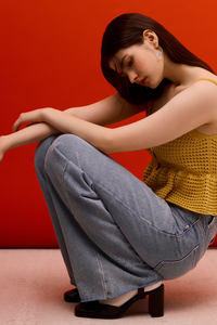 Semi-Sheer Peplum Knit Top