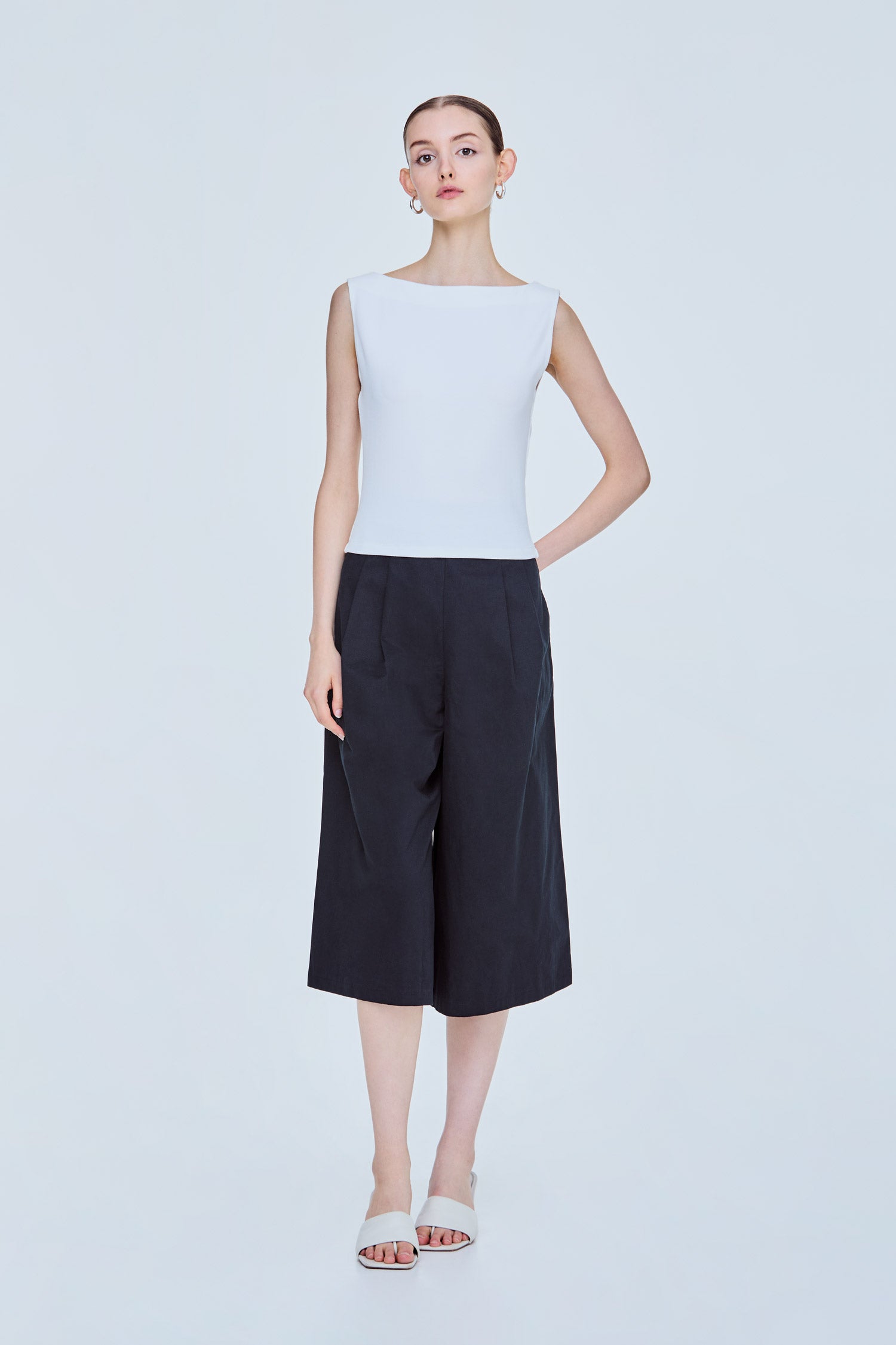 Clean Sleeveless Boat Neck Top